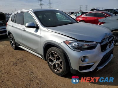 Czwarte zdjęcie samochodu z boku: 2018 BMW X1 XDRIVE28I VIN:WBXHT3C32J5L32188 - miniatura