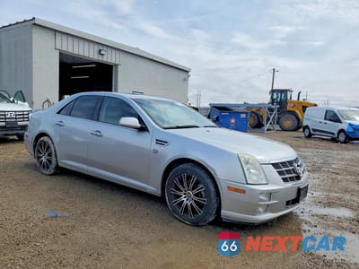 Czwarte zdjęcie samochodu z boku: 2010 CADILLAC STS VIN:1G6DU6EAXA0133881 - miniatura