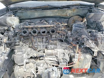 Zdjęcie 12 z 14 samochodu: 2006 KIA OPTIMA LX VIN:KNAGE123465074978 - miniatura