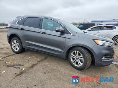 Czwarte zdjęcie samochodu z boku: 2019 FORD EDGE SEL VIN:2FMPK4J90KBC42815 - miniatura