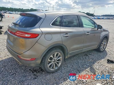 Trzecie zdjęcie samochodu z tyłu: 2017 LINCOLN MKC SELECT VIN:5LMCJ2D96HUL08138 - miniatura