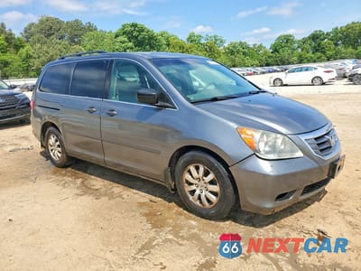Czwarte zdjęcie samochodu z boku: 2010 HONDA ODYSSEY EXL VIN:5FNRL3H73AB018769 - miniatura