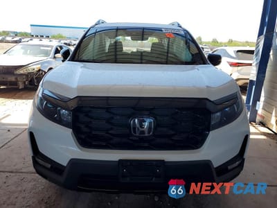 Piąte zdjęcie samochodu w środku: 2023 HONDA PASSPORT VIN:5FNYF8H04PB019747 - miniatura