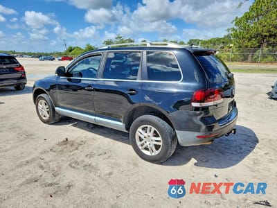 Drugie zdjęcie samochodu z przodu: 2010 VOLKSWAGEN TOUAREG TDI VIN:WVGFK7A90AD000497 - miniatura