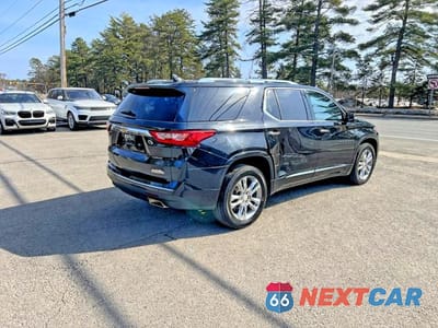Czwarte zdjęcie samochodu z boku: 2019 CHEVROLET TRAVERSE HIGH COUNTRY VIN:1GNEVJKW3KJ264381 - miniatura