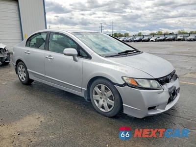 Czwarte zdjęcie samochodu z boku: 2010 HONDA CIVIC LX VIN:2HGFA1F54AH302910 - miniatura