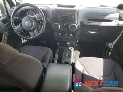 Zdjęcie 8 z 13 samochodu: 2013 JEEP WRANGLER UNLIMITED SPORT VIN:1C4HJWDG4DL553961 - miniatura