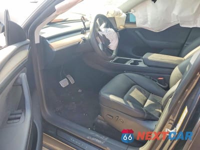 Zdjęcie 8 z 12 samochodu: 2024 TESLA MODEL Y VIN:7SAYGDEF5RA308377 - miniatura