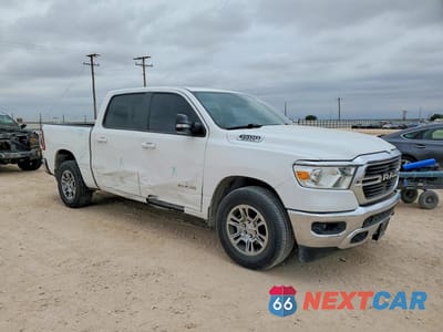 Czwarte zdjęcie samochodu z boku: 2021 RAM 1500 BIG HORN VIN:1C6RREFTXMN708204 - miniatura