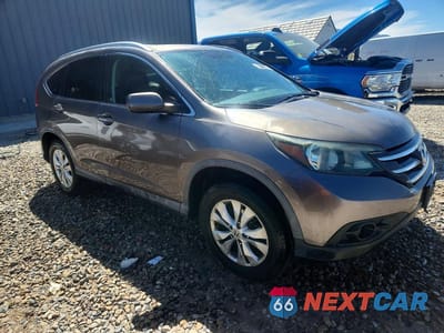 Czwarte zdjęcie samochodu z boku: 2012 HONDA CR-V EXL VIN:5J6RM4H7XCL039499 - miniatura