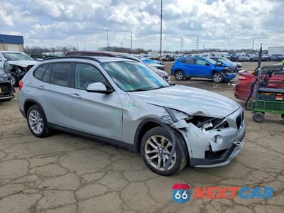 Czwarte zdjęcie samochodu z boku: 2015 BMW X1 XDRIVE28I VIN:WBAVL1C53FVY32144 - miniatura