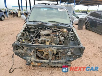 Piąte zdjęcie samochodu w środku: 1995 TOYOTA 4RUNNER SR5 V6 VIN:JT3VN39W7S0178575 - miniatura