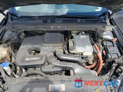 Zdjęcie 11 z 12 samochodu: 2014 FORD FUSION S HYBRID VIN:3FA6P0UU1ER221252 - miniatura