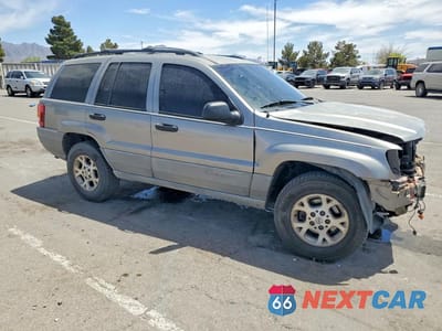 Czwarte zdjęcie samochodu z boku: 1999 JEEP GRAND CHEROKEE LAREDO VIN:1J4GW58S1XC564663 - miniatura