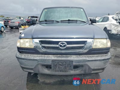 Piąte zdjęcie samochodu w środku: 2001 MAZDA B3000 CAB PLUS VIN:4F4YR16V31TM26399 - miniatura