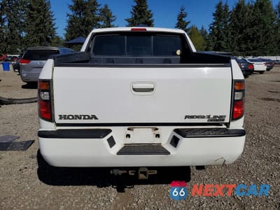 Zdjęcie 6 z 12 samochodu: 2006 HONDA RIDGELINE RTS VIN:2HJYK16426H557490 - miniatura