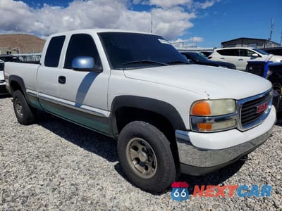Czwarte zdjęcie samochodu z boku: 2001 GMC NEW SIERRA K1500 VIN:2GTEK19T811245850 - miniatura
