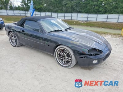 Czwarte zdjęcie samochodu z boku: 2003 JAGUAR XK8 VIN:SAJDA42C732A31210 - miniatura
