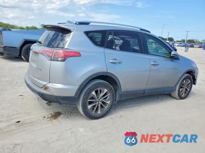 Trzecie zdjęcie samochodu z tyłu: 2018 TOYOTA RAV4 HYBRID LE VIN:JTMRJREV5JD213856 - miniatura