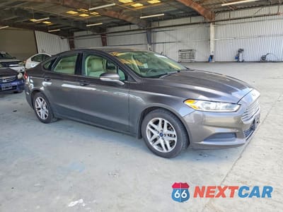 Czwarte zdjęcie samochodu z boku: 2016 FORD FUSION SE VIN:3FA6P0H73GR386890 - miniatura