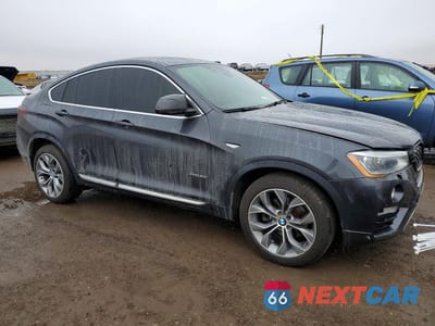Czwarte zdjęcie samochodu z boku: 2016 BMW X4 XDRIVE28I VIN:5UXXW3C52G0R21845 - miniatura