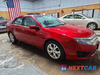 Czwarte zdjęcie samochodu z boku: 2012 FORD FUSION SE VIN:3FAHP0HAXCR268012 - miniatura