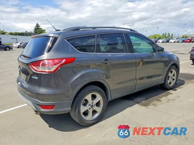Trzecie zdjęcie samochodu z tyłu: 2015 FORD ESCAPE SE VIN:1FMCU0GX3FUA53065 - miniatura