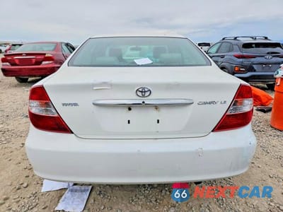 Zdjęcie 6 z 12 samochodu: 2002 TOYOTA CAMRY LE VIN:4T1BE32K02U069918 - miniatura