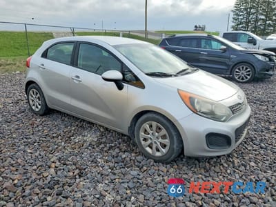 Czwarte zdjęcie samochodu z boku: 2012 KIA RIO LX VIN:KNADM5A39C6017342 - miniatura