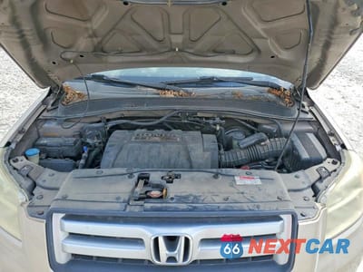 Zdjęcie 12 z 13 samochodu: 2006 HONDA PILOT EX VIN:5FNYF28576B000696 - miniatura