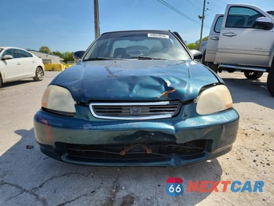 Piąte zdjęcie samochodu w środku: 1998 HONDA CIVIC LX VIN:1HGEJ6673WL014168 - miniatura