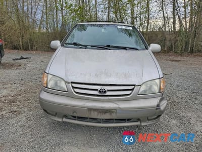 Piąte zdjęcie samochodu w środku: 2002 TOYOTA SIENNA XLE VIN:4T3ZF13C82U451662 - miniatura