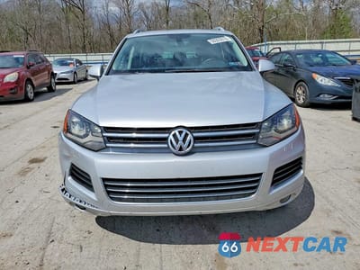 Piąte zdjęcie samochodu w środku: 2013 VOLKSWAGEN TOUAREG V6 VIN:WVGEF9BP5DD006647 - miniatura