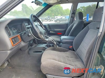 Zdjęcie 7 z 14 samochodu: 1998 JEEP GRAND CHEROKEE LAREDO VIN:1J4FX58S7WC317266 - miniatura