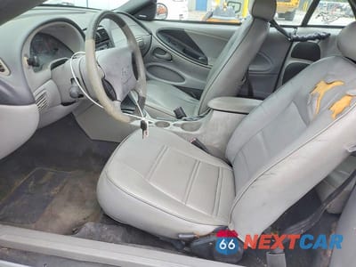 Zdjęcie 7 z 11 samochodu: 2004 FORD MUSTANG VIN:1FAFP44654F208377 - miniatura