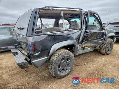 Trzecie zdjęcie samochodu z tyłu: 1999 CHEVROLET TAHOE K1500 VIN:3GNEK18RXXG218193 - miniatura