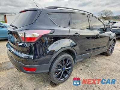 Trzecie zdjęcie samochodu z tyłu: 2017 FORD ESCAPE TITANIUM VIN:1FMCU0JD9HUA10660 - miniatura