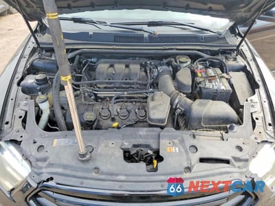 Zdjęcie 11 z 11 samochodu: 2014 FORD TAURUS SEL VIN:1FAHP2E86EG170800 - miniatura