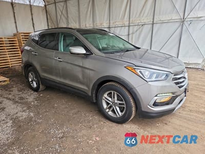 Czwarte zdjęcie samochodu z boku: 2018 HYUNDAI SANTA FE SPORT 2.4L VIN:5XYZUDLB0JG514586 - miniatura