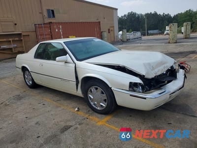 Czwarte zdjęcie samochodu z boku: 1997 CADILLAC ELDORADO VIN:1G6EL12Y8VU614304 - miniatura