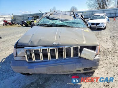 Piąte zdjęcie samochodu w środku: 1998 JEEP GRAND CHEROKEE LAREDO VIN:1J4GZ58S0WC110636 - miniatura