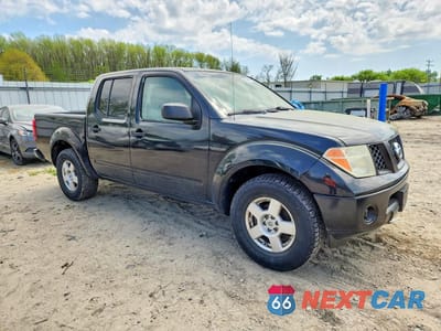 Czwarte zdjęcie samochodu z boku: 2006 NISSAN FRONTIER SE VIN:1N6AD07U26C406559 - miniatura