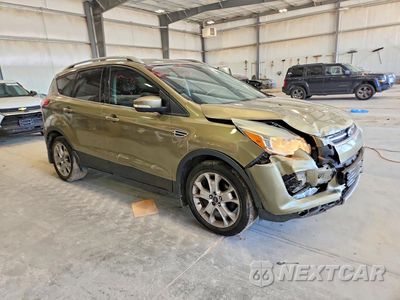 Czwarte zdjęcie samochodu z boku: 2014 FORD ESCAPE TITANIUM VIN:1FMCU0JX1EUA82443 - miniatura