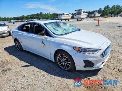 Czwarte zdjęcie samochodu z boku: 2019 FORD FUSION SEL VIN:3FA6P0CD5KR138842 - miniatura