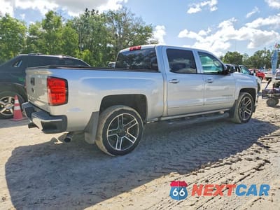 Trzecie zdjęcie samochodu z tyłu: 2018 CHEVROLET SILVERADO C1500 LT VIN:3GCPCREC7JG273916 - miniatura