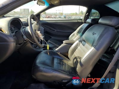 Zdjęcie 7 z 13 samochodu: 2000 FORD MUSTANG GT VIN:1FAFP42X1YF201055 - miniatura