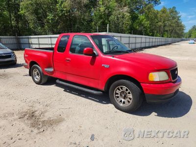 Czwarte zdjęcie samochodu z boku: 2003 FORD F150 VIN:1FTRX07243KC92609 - miniatura