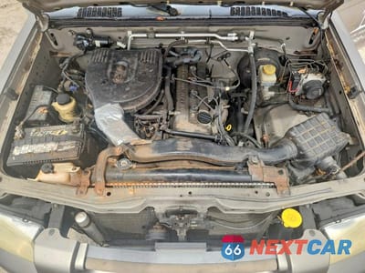 Zdjęcie 11 z 11 samochodu: 2004 NISSAN FRONTIER STANDARD VIN:1N6DD26T44C450609 - miniatura