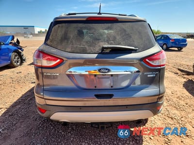 Zdjęcie 6 z 13 samochodu: 2014 FORD ESCAPE TITANIUM VIN:1FMCU9JX8EUA77258 - miniatura