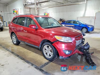 Czwarte zdjęcie samochodu z boku: 2010 HYUNDAI SANTA FE LIMITED VIN:5NMSK4AG9AH379300 - miniatura